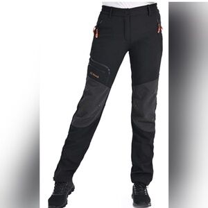 Postropaky women’s black ski pant size 4-Reg NWOT